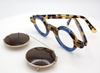 Round spectacles with thick acetate rims hand made in Germany by Schunchel with matching sun clip at www.theoldglassesshop.co.uk