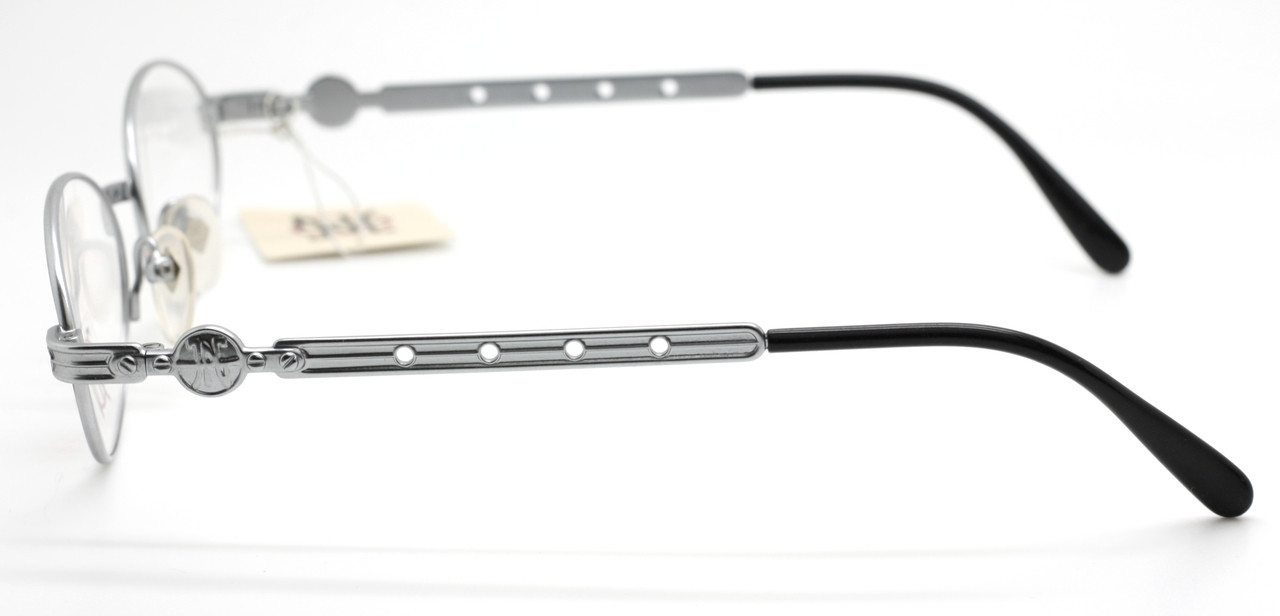 Distinctive 'hole' detailing to the frame