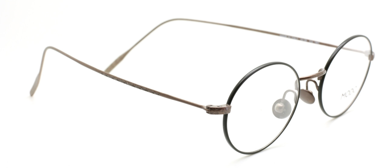 Modo 174 Italian Eyewear Small Oval Shape Frames In A Black & Brown Combination