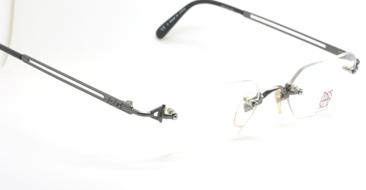 Jean Paul Gaultier 7105 Vintage Hexagonal Rimless Eyewear In A Gunmetal Finish