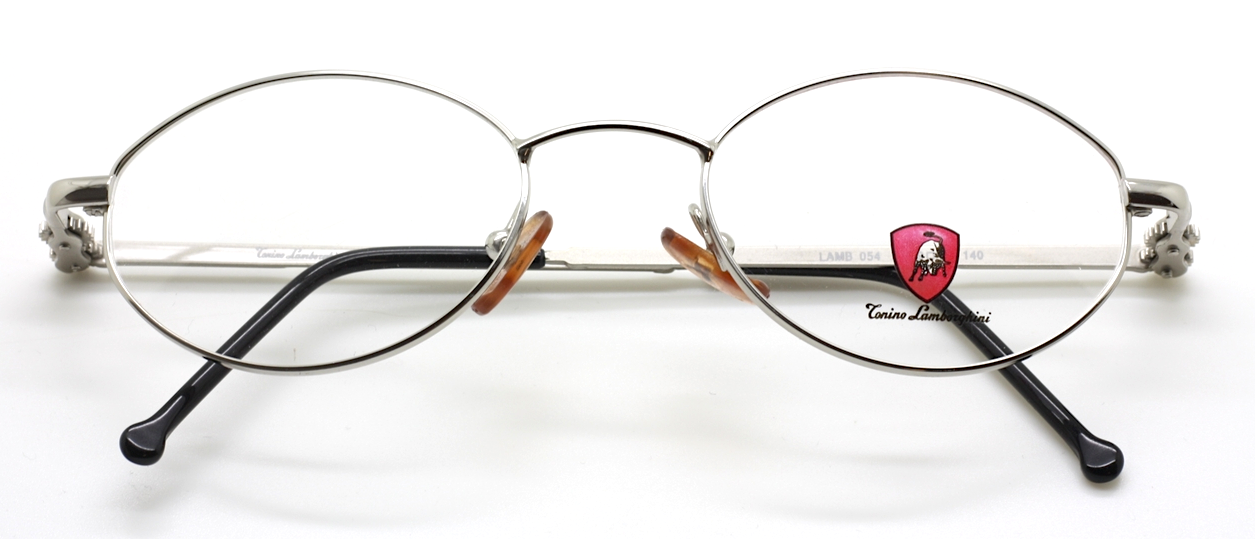 Designer Tonino Lamborghini 054 Metal Oval Cog Design Glasses In A Silver Finish With Black Ear Pieces