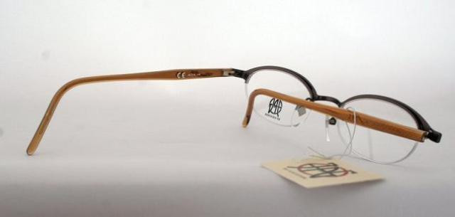 Jean Paul Gaultier 0013 Half Rim Oval Spectacles In A Bronze Finish 48mm Lens Size