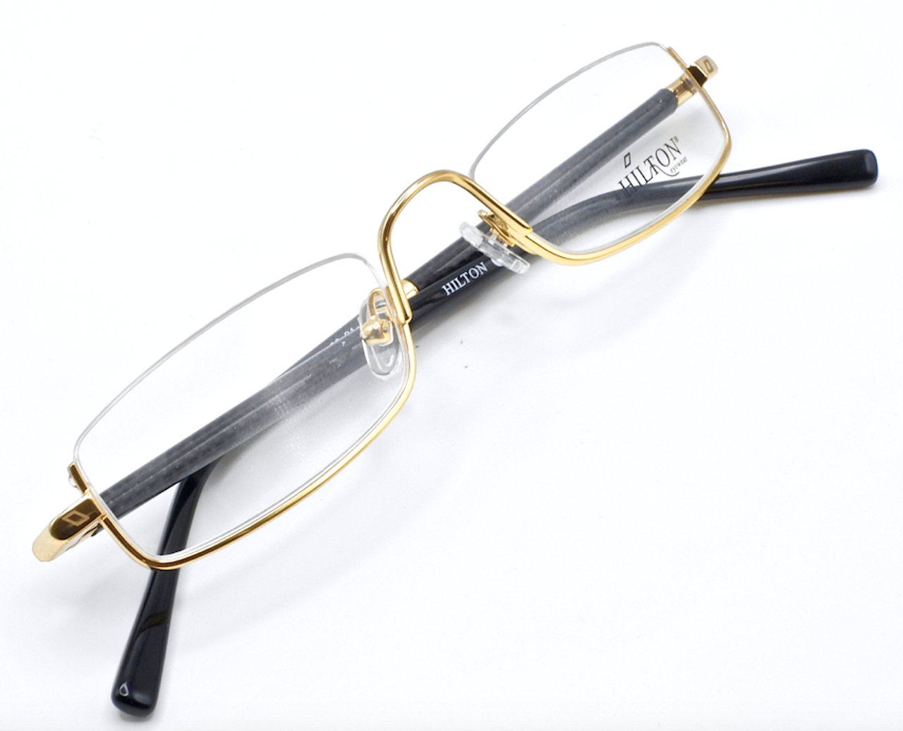 Vintage reading eyeglasses in a shiny gold finish at www.theoldglassesshop.co.uk