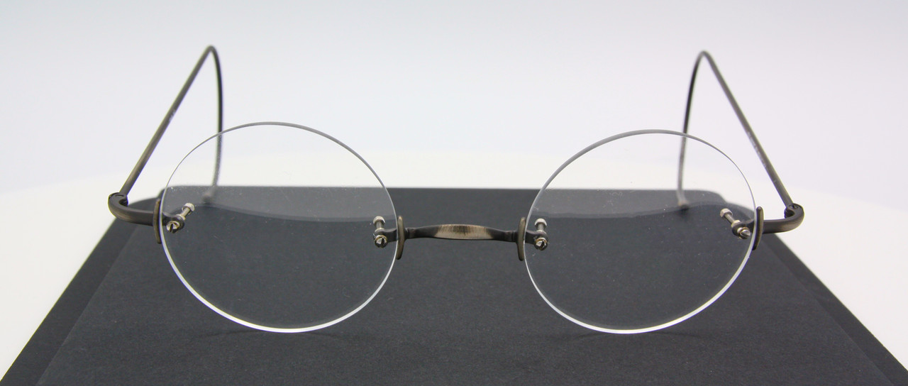 44mm True round rimless eyewear by Beuren 1919 in antique silver at www.theoldglassesshop.co.uk