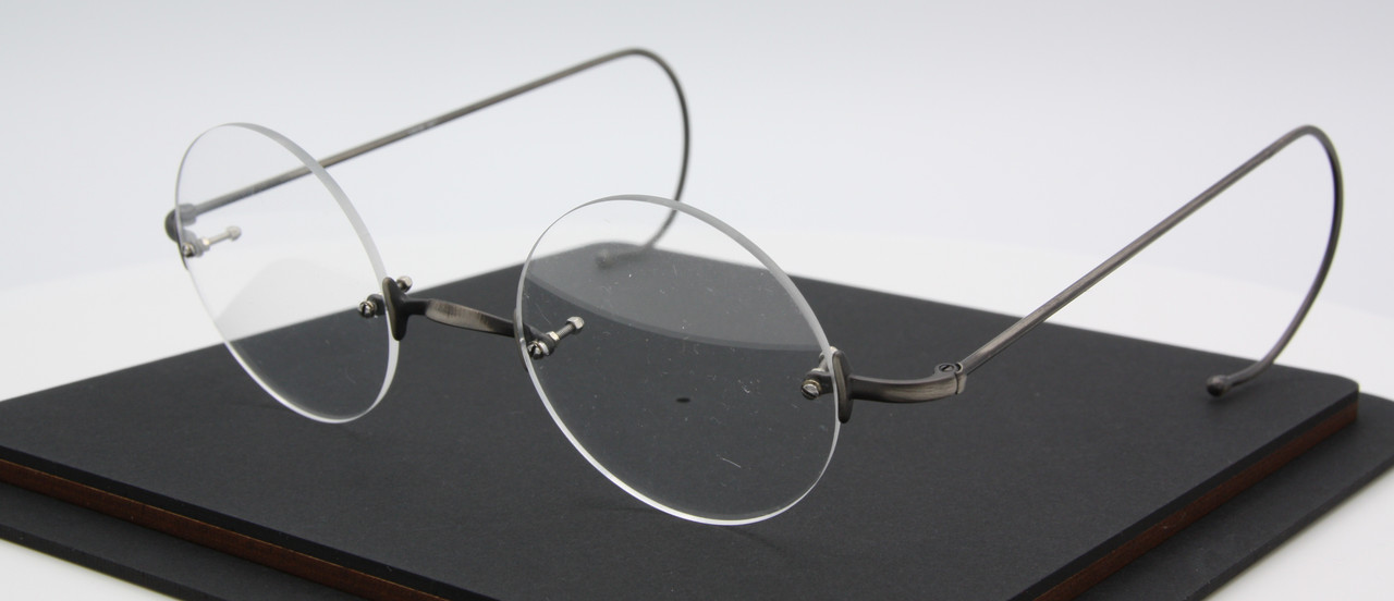 Antique Silver Rimless True Round EyeGlasses By Beuren With Saddle Bridge And Curlside Arms 40mm-50mm Lens Size