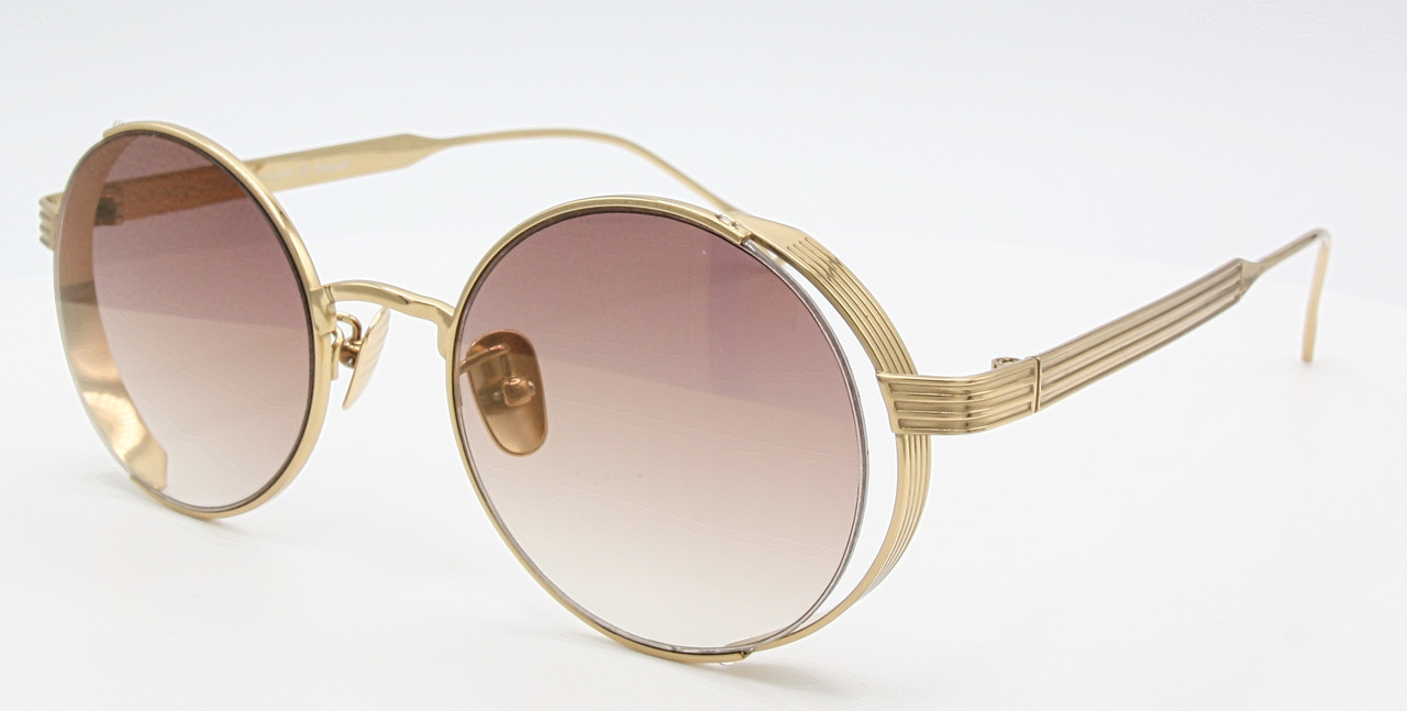 Designer titanium sunglasses by Les Pieces Uniques can be bought at www.theoldglassesshop.co.uk