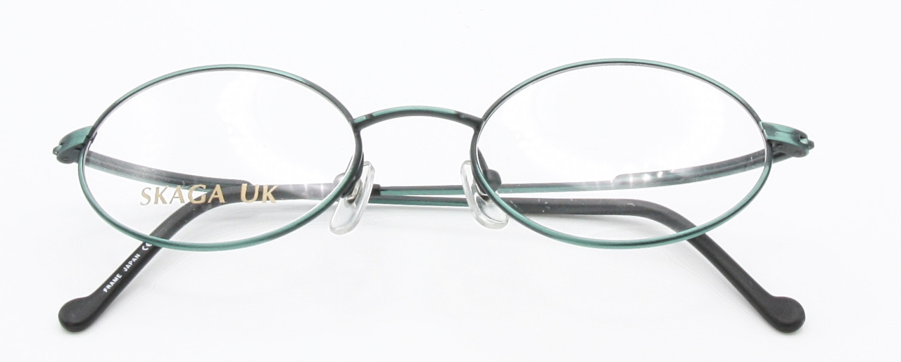 Vintage oval eyewear in a green finish with bowed temples for added comfort at The Old Glasses Shop Ltd