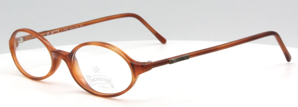 Winchester WM0098 sleek oval eyewear in a demi blonde acrylic at The Old Glasses Shop