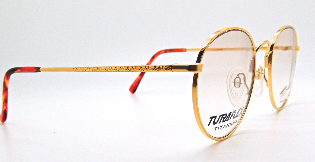 Superb Tura Flex Titanium Designer Gold Panto Eyewear Frames by Tura