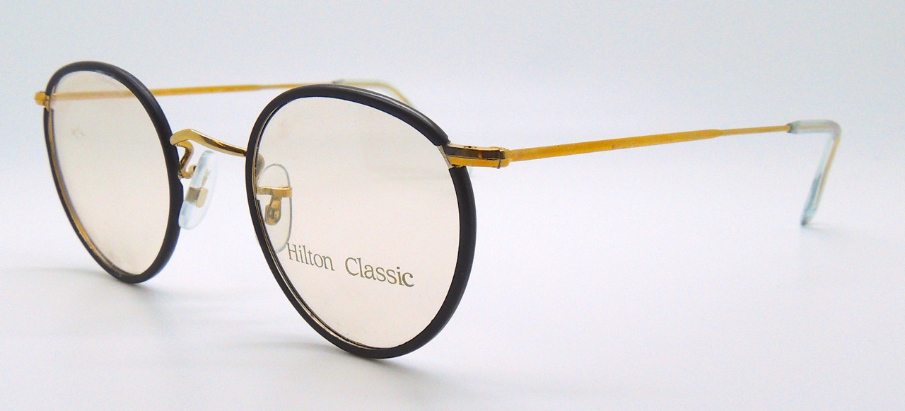 Buy online glasses handmade in England. Hilton Classic Panto prescription glasses with black rims.