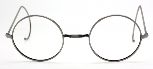 Varying round lens sizes in this antique silver frame from www.theoldglassesshop.co.uk