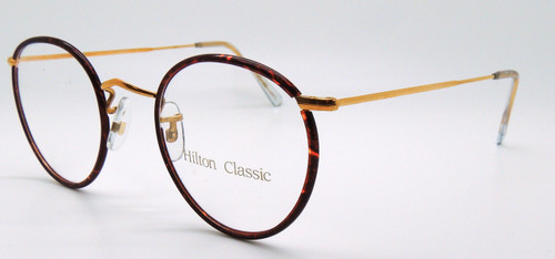 Round hand made glasses frames manufactured by Savile Row London