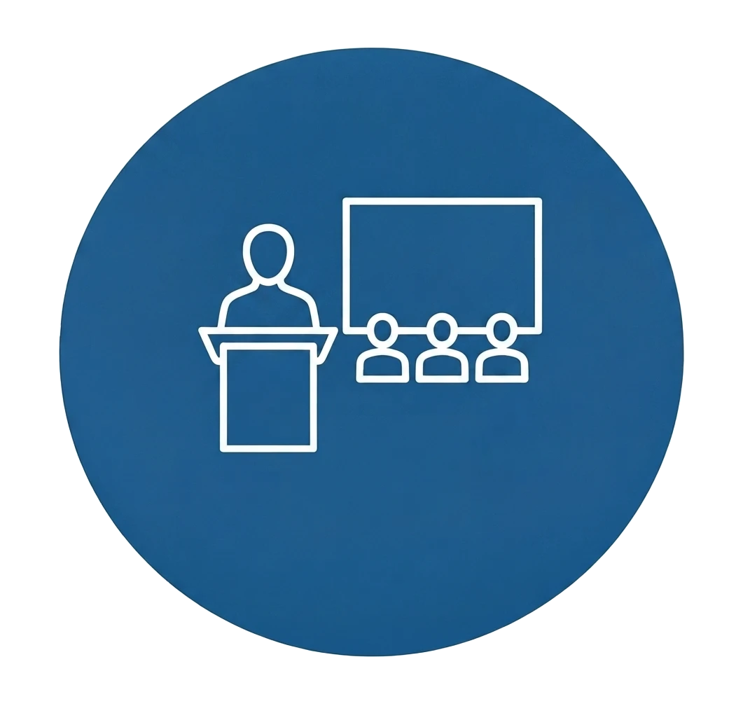 Man at podium in front of class in blue circle