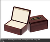 Rosewood stained piano finish jewelry box with beige felt lining
7 " x  5 "