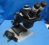 BAUSCH & LOMB 0.7X - 3X MICROSCOPE ON STAND WITH LIGHT SOURCE 15X WF EYE PIECES