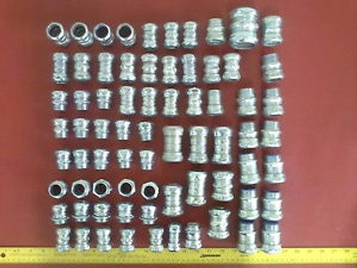 GOODY BOX OF ASSORTED SIZED ELECTRICAL COUPLINGS 1 3/4 1 1/2