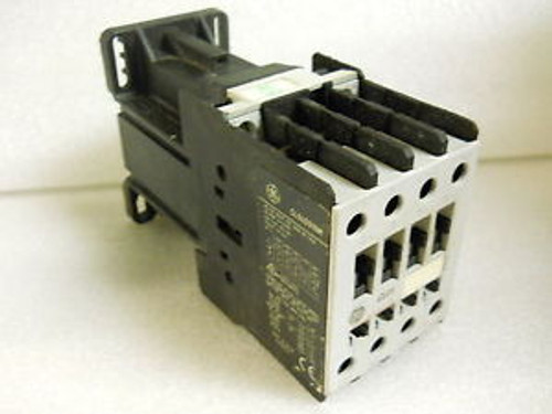 GENERAL ELECTRIC CL04D310M CONTACTOR 4 POLE 24V COIL NEW CONDITION NO BOX