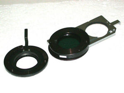 Polarizer slider and diaphragm for the Olympus NIC Nomarski DIC condenser.