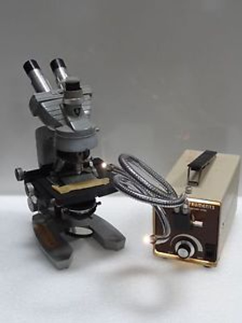 AO Spencer Trinocular Head Microscope with Light Source