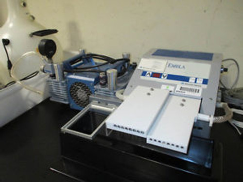 SKATRON EMBLA 384 MICROPLATE WASHER WITH BOTTLES.