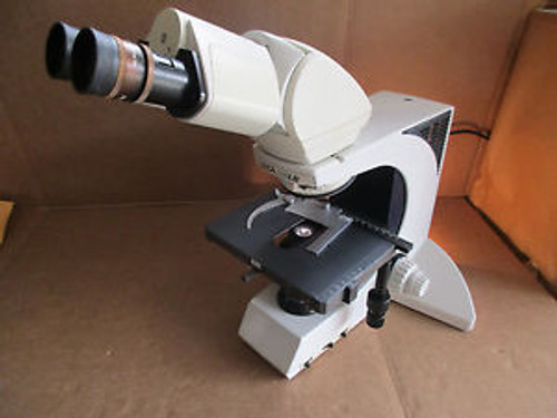 Leica DMLB Microscope 020-519.507 w/ 2 Eyepieces ( HC Plan 10x/20)
