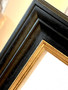 Satin black wood frame with gold inline 