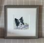 Original painting of a collie dog in a grey frame with a swaledale sheep in the background