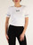 T-shirt cropped in cotone stretch con stampa logo
