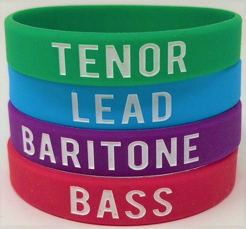 Wear them. Collect them. Share them.

Our silicone wristbands are great for collecting, sharing, gifting, and identifying tag singers.

EVERYONE IN HARMONY on one side and your voice part, whether it be TENOR, LEAD, BARITONE, OR BASS, on the other.

Each wristband is colorfully coordinated with its own voice part:

Green - Tenor, Red - Bass, Blue - Lead, Purple - Baritone. 

Part of our Everyone In Harmony Collection. 