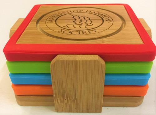 This beautiful set of coasters will not only keep your table dry, but also be a wonderful place setting to any decor.
They are made of bamboo and surrounded by a silicone cover.
Coaster set contains one of each color in Blue, Green, Orange, and Red.
Includes a bamboo coaster holder for storage and safe keeping.