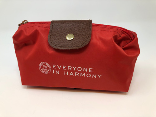 This small, compact cosmetic bag is perfect for on-the-go travelling.

Available in red, it can fit the essentials or be used as an ideal spot for emergency supplies. 

It not only has a top zipper, but also utilizes a single flap enclosure to ensure extra security. 