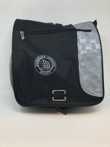 The BHS Messenger Bag is a convenient travel commodity for work, school, conventions, and other events.  

Made by Leed's, it is designed as a Gridlock Vertical Messenger Bag that can fit up to a 15" computer, as well as outer and internal storage for additional supplies, including notebooks and other essentials. 
