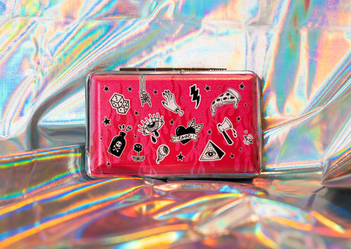 A pink compact case with a cool all around print with black stars, dices, skeleton hands, an eye crying and a slice of pizza with lighting bolts.
