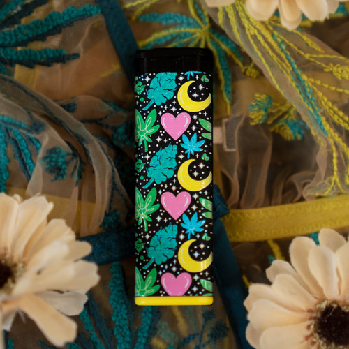 A unique green themed windproof refillable torch lighter with yellow crescent moons, pink hearts, white stars, and green bud. This lighter comes in 5 different rim colors, purple, blue, yellow, green, and orange.