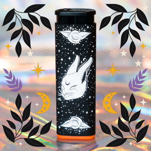 A black unique windproof refillable torch lighter with a rabbit head, the rabbit has a crescent moon on its forehead, the lighter also has white stars all over and little white crescent moons, it also has a rosebud on the top and bottom.