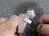 To use the magnesium as tinder to help start your fire, shave off slivers of fine magnesium from the magnesium bar using your Super Scraper or a knife.