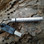 The Pup FireSteel Tube includes a FireSteel.com FireSteel that screws into a protective aluminum tube, a 1" diameter key ring and FireSteel.com Super Scraper.