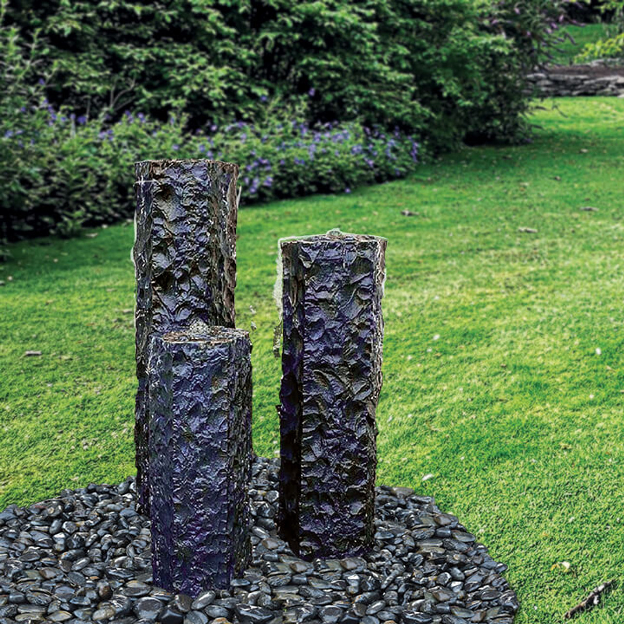 The unique texture of the richly colored Tranquil Décor Midnight Basalt Fountain Trio enhances the water flow, making it the perfect statement piece. Give your garden or yard an amazing centerpiece for all to admire. This complete kit contains three basalt columns, basin with support blocks, pump, plumbing and light kits.