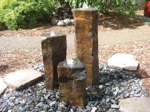 Basalt columns are core drilled with a 1 1/4" hole from end to end, the last 1 1/2" is enlarged to 13/8" to hide light ring.