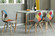 Mid-Century Modern Upholstered Plastic Multicolor Fabric Patchwork DSW Shell Dining Chair with Wooden Dowel Eiffel Legs