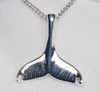 Sterling Silver-2.5cm tall , on a complimentary silverplate cahin