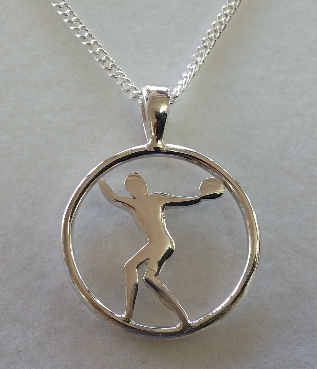 Silver Discus Pendant ( only 2 left in stock)