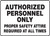 MADM421XF authorized personnel only proper safety attire required at all times sign