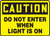 Caution - Do Not Enter When Light Is On