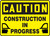 Caution - Construction In Progress Sign
