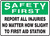 Safety First - Report All Injuries No Matter How Slight To First Aid Station - Plastic - 10'' X 14''