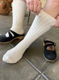 Warrior Alpaca Socks Wide leg comfort with gentle top on model.