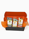 St. Nicholas Sock Box with three pairs of alpaca socks for kids displayed in a Warrior sock box