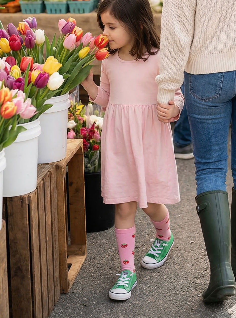 Berry Sweet Pink Strawberry Alpaca Socks on 5 year old girl, lifestyle image