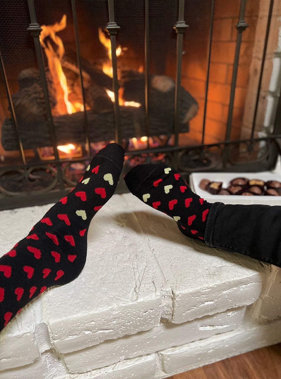 Found Hearts Novelty Alpaca Crew Socks on Men and Women by fire.